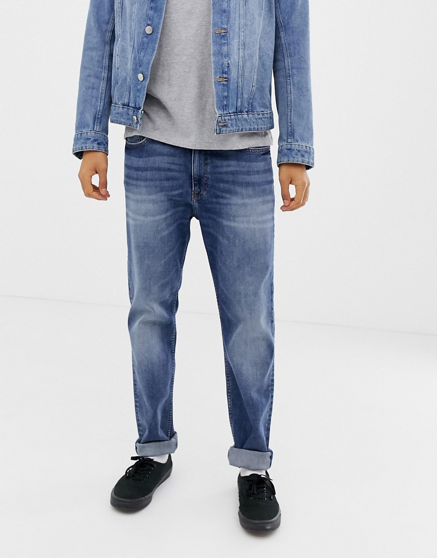Cheap Monday - Jeans met smaltoelopende pijpen in blauw