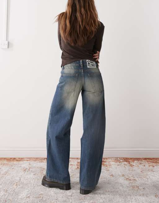 Cheap Monday Poser mid rise wide leg skater jeans in blue wash with faded highlights