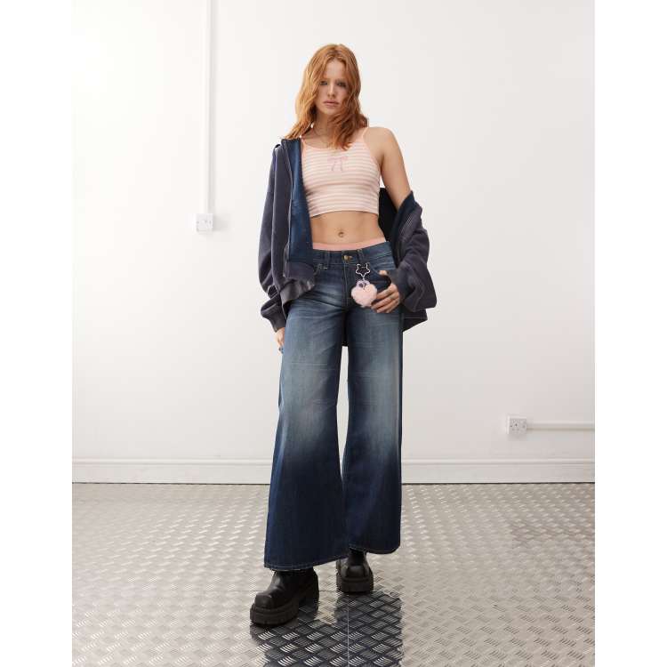 Cheap Monday Poser mid rise wide leg skater jeans in star dark wash blue ASOS