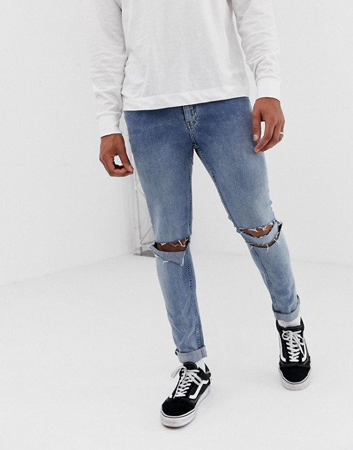 Cheap Monday Skinny Tight Jeans In Sacred Blue With Knee Rips | ASOS