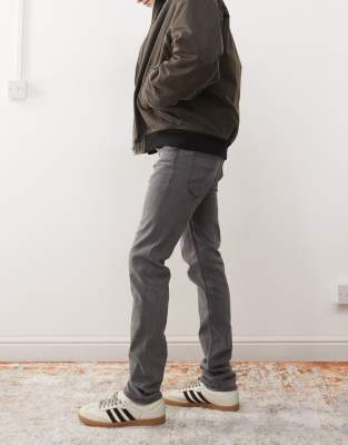 CHEAP MONDAY SLEEZE SUPER STRETCH SKINNY JEANS