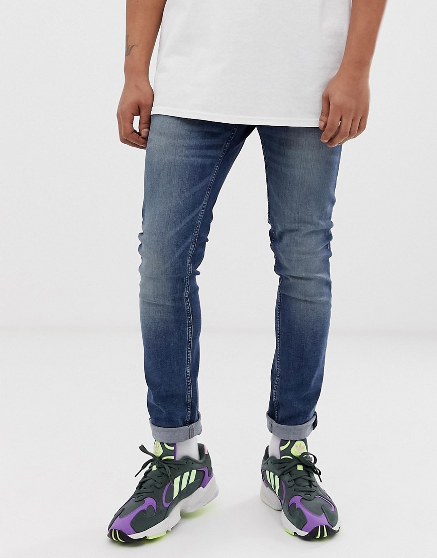 Cheap Monday stramtsiddende skinny jeans i indigo head-Blå