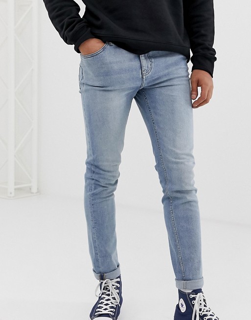 Cheap Monday tight skinny jeans in stonewash blue