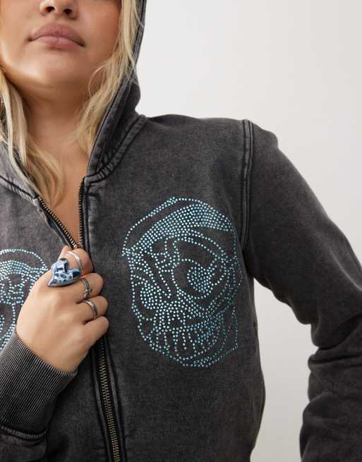 Cheap Monday zip front hoodie with rhinestone skull graphic in acid washed black