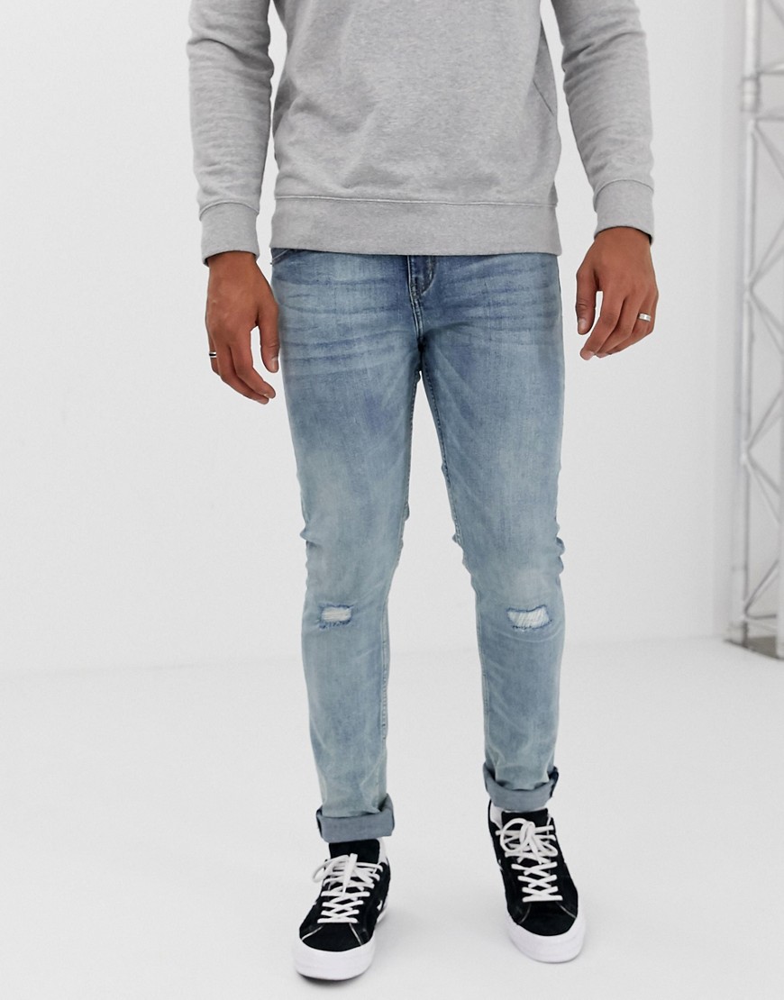 Cheap Monday stramme skinny jeans med hullede knæ-Blå