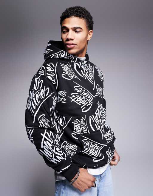 Cheats & Thieves - Sweat à capuche en tissu 320 g/m<sup>2</sup> avec logo sur l'ensemble - Noir multicolore