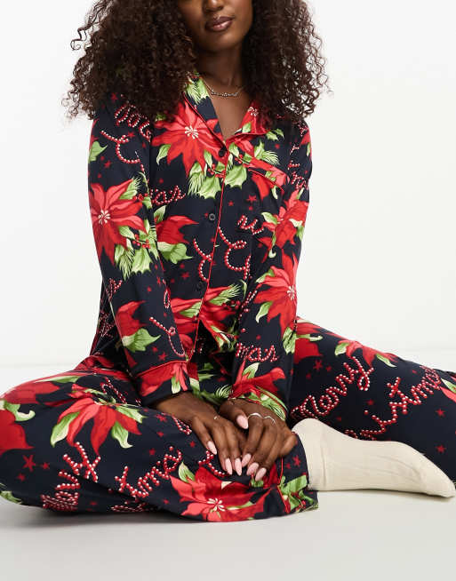 Chelsea Peers christmas long pyjama set in navy poinsetta print