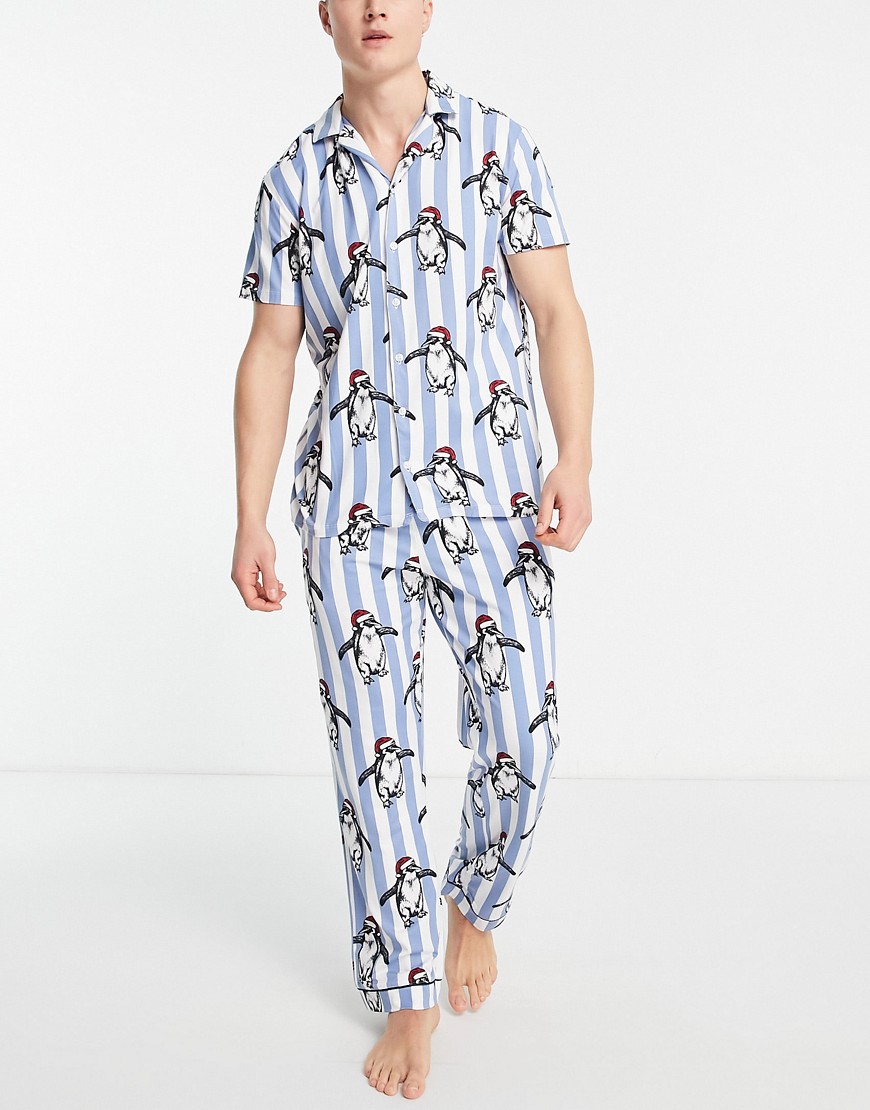 Christmas pajamas in blue stripe with penguin print