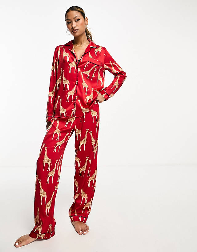 Chelsea Peers - christmas satin giraffe print long sleeve top and trouser pyjama set in red