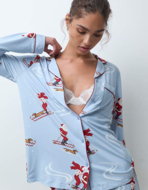 Chelsea Peers Christmas super soft button up pyjama set in blue skiing santa, 3 of 4
