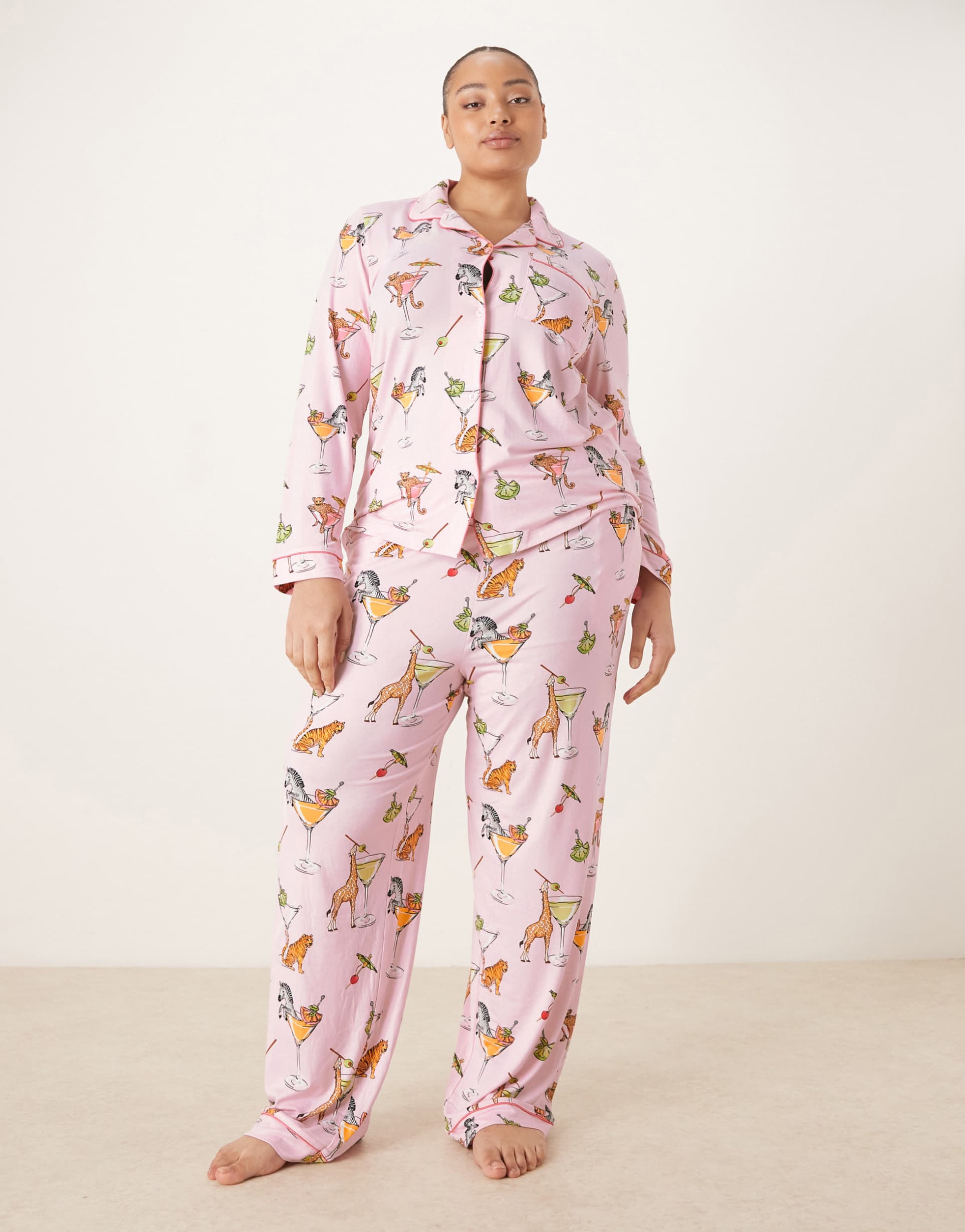 chelsea peers curve long button up pajama set in pink martini animal print