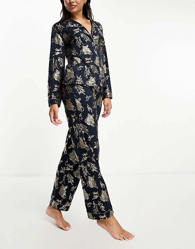 Chelsea Peers - exclusive christmas jersey gold foil zebra print revere top and trouser pyjama set in navy
