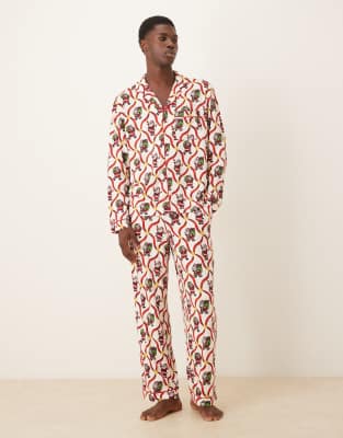 Chelsea Peers Chelsea Peers Exclusive His & Hers poly long sleeve revere pyjama set in Christmas candycane santa print-White