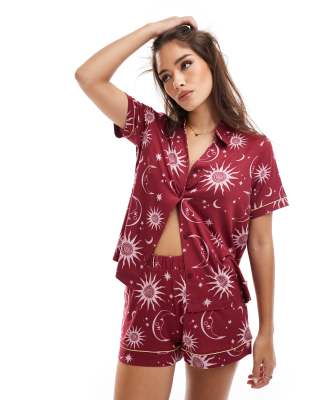 Exclusive moon and star print short sleeve revere and short pajama set in cherry red