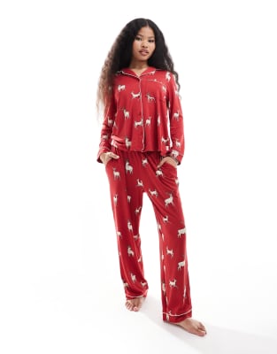 Chelsea Peers Petite Chelsea Peers Exclusive Petite Christmas His & Hers long sleeve revere and trouser pyjama set in reindeer print-Red