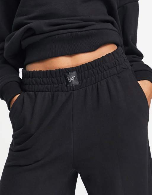 Chelsea Peers high waist wide leg joggers with woven logo tab in black