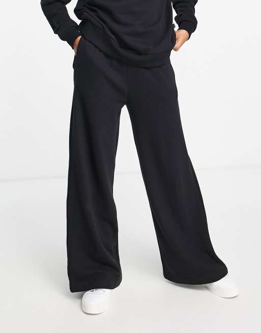 Chelsea Peers high-waist wide leg pants with woven logo tab in black