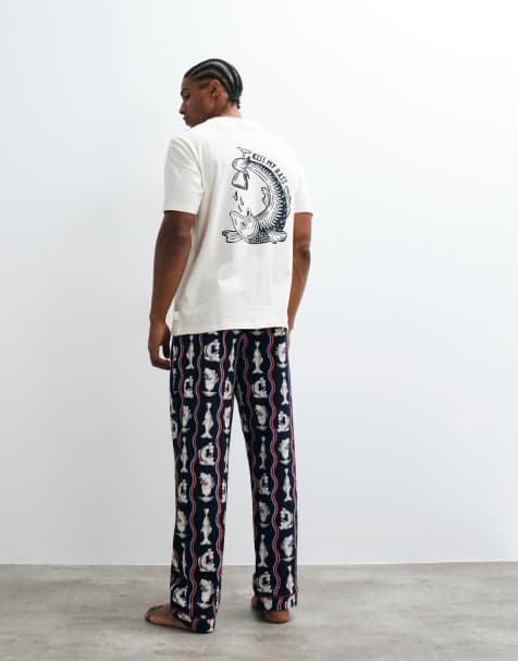 Chelsea Peers mens t-shirt and trousers pyjama set in wavy fish print - view 1