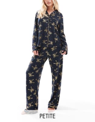 Chelsea Peers Petite Chelsea Peers Petite poly Christmas foil bow print long sleeve revere and trouser pyjama set in navy