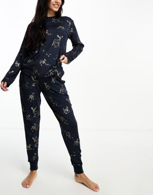 Chelsea Peers jersey crew neck top and trouser pyjama set with gold foil reindeer print in navy - ASOS Price Checker