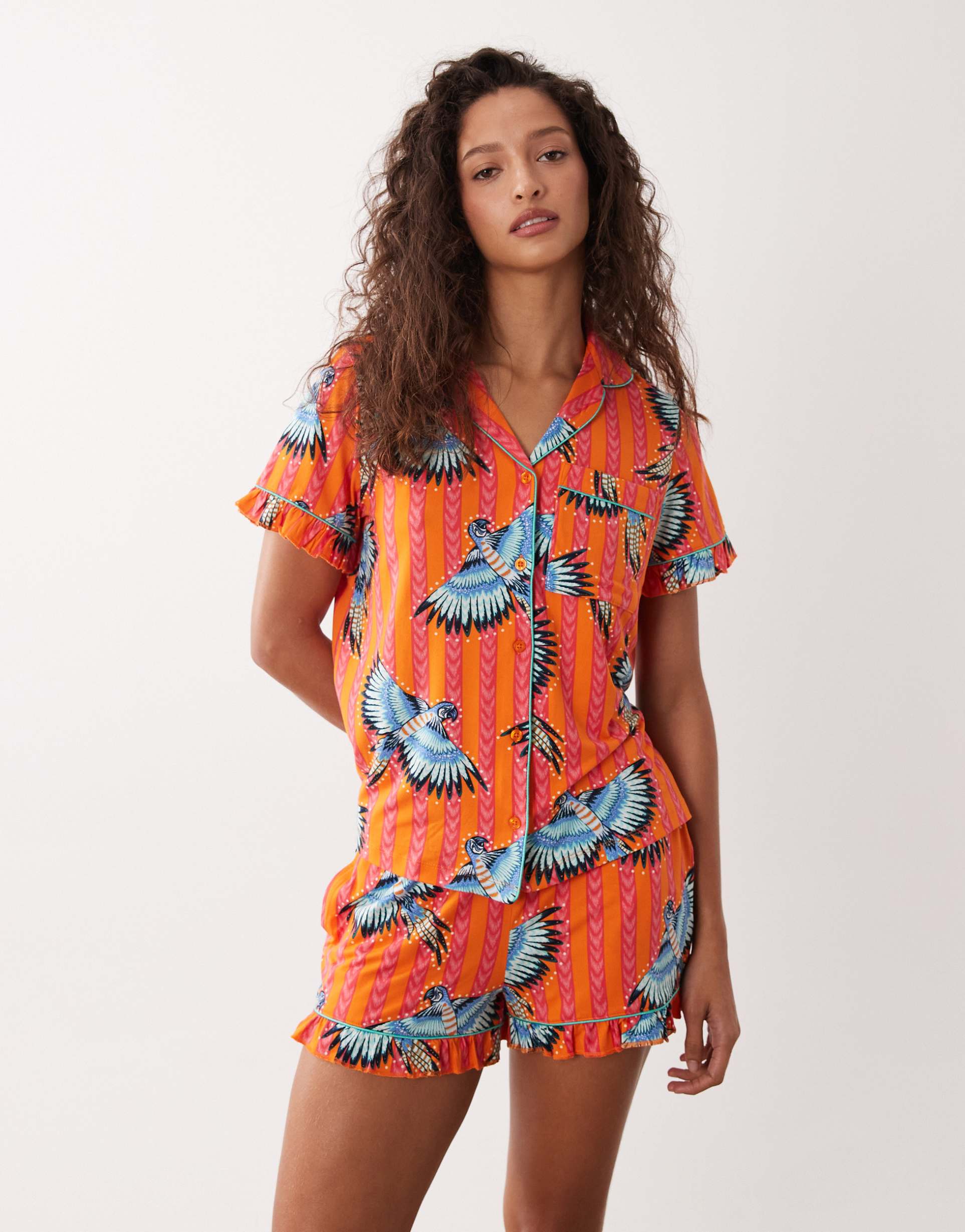 chelsea peers short sleeve jersey camp collar shirt and shorts pajama set with ruffle trim in exotic bird print