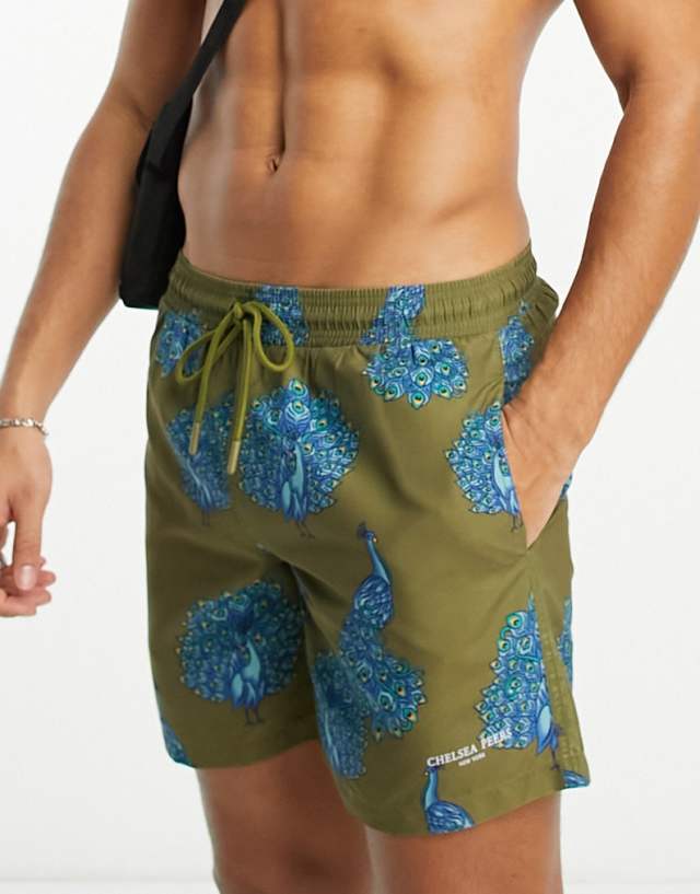 Chelsea Peers swim short in green and blue peacock print