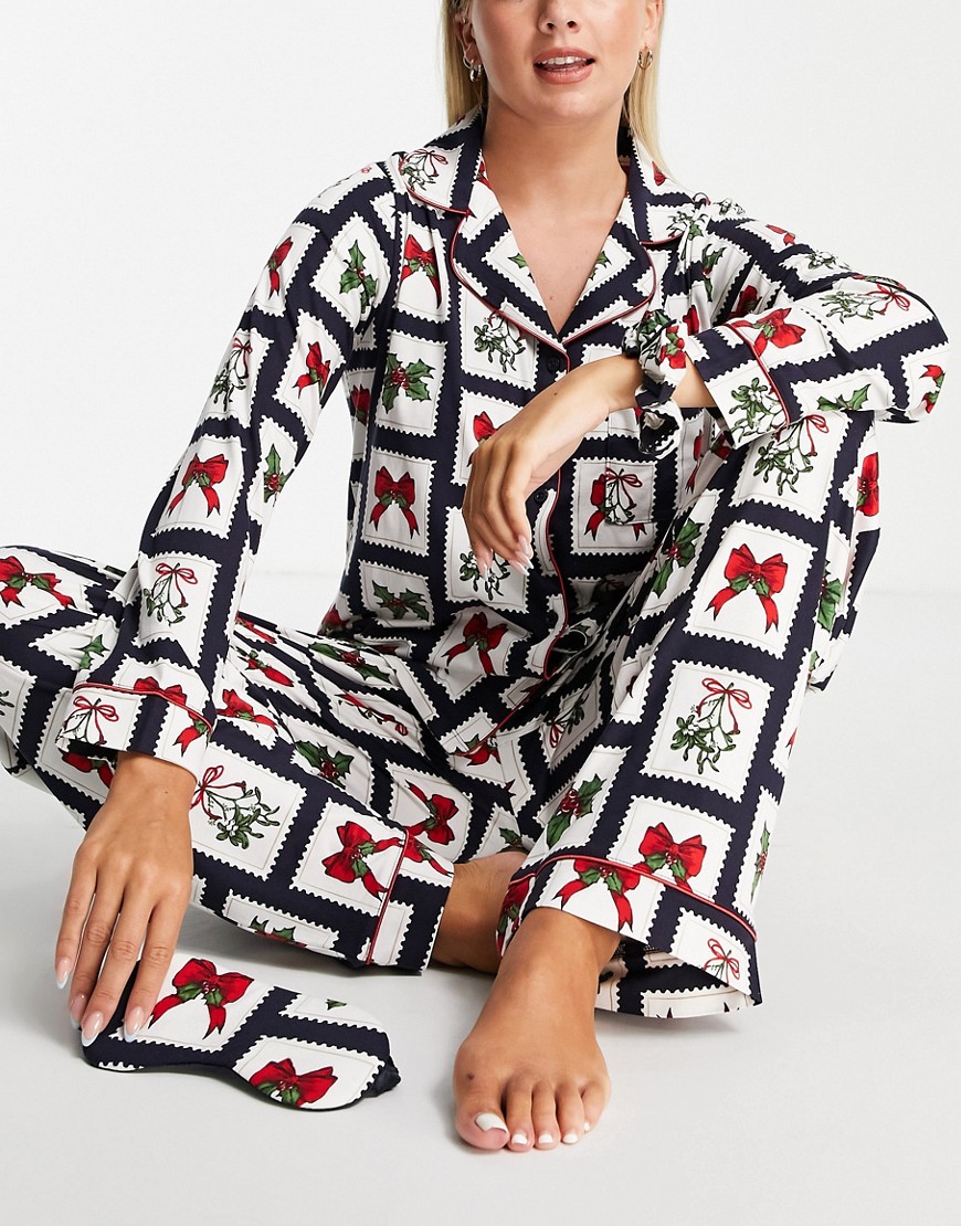 Chelsea Peers top and pants pajama set with eyemask and scrunchie in christmas stamp print-Navy