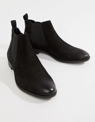 Chelsea-støvler i voksblankt sort læder fra Pier One