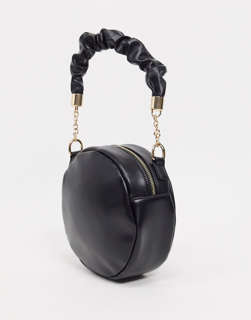 фото Черная круглая сумка с ремешком в стиле резинки для волос svnx-черный