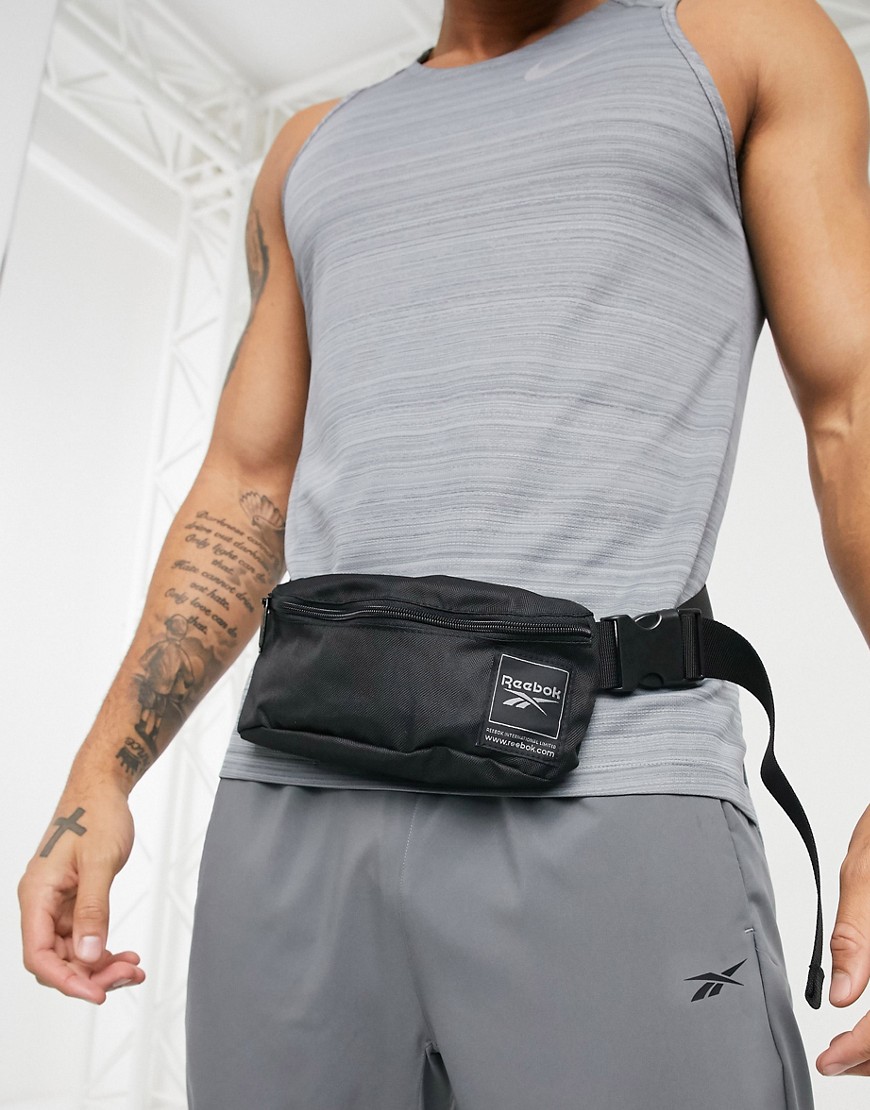 фото Черная спортивная сумка-кошелек на пояс reebok workout ready-черный
