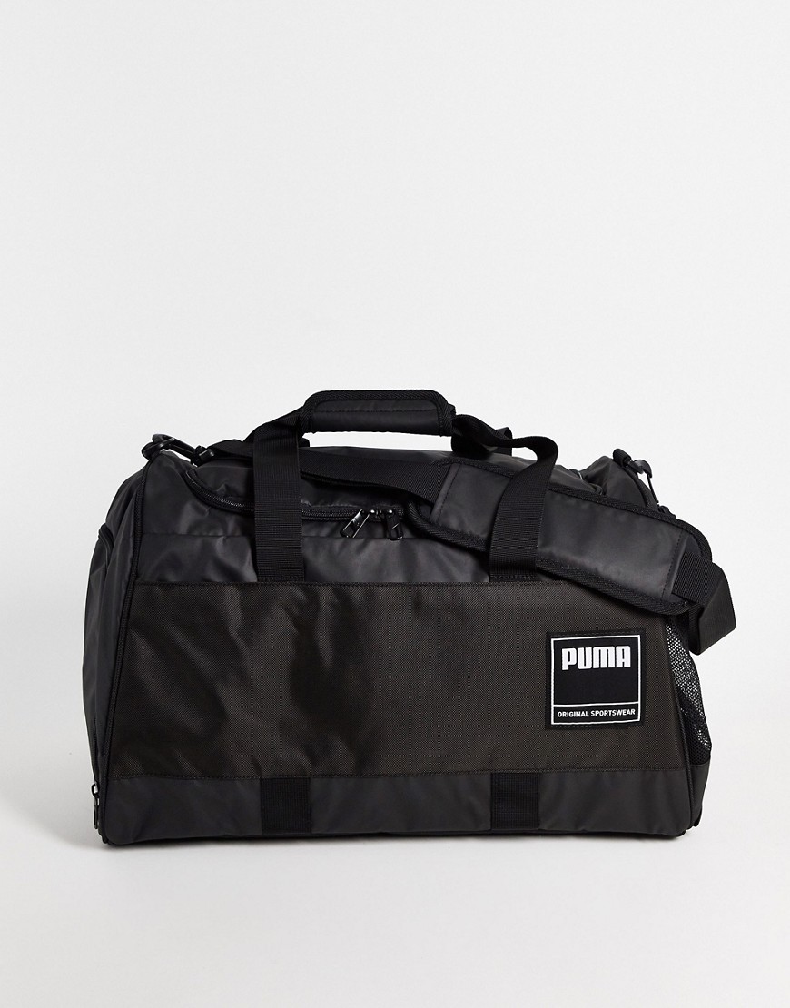 фото Черная спортивная сумка среднего размера puma training-черный цвет
