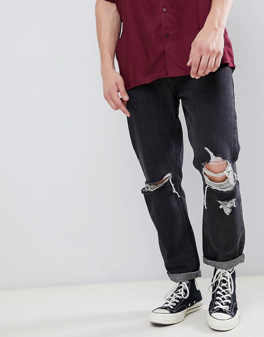 фото Черно-белые выбеленные джинсы с рваной отделкой rollas-черный