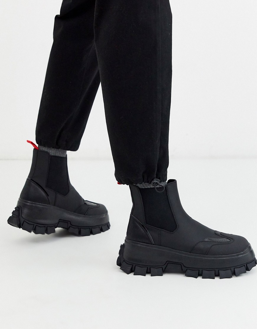 фото Черные ботинки челси с ремешками и тракторной подошвой asos design-черный