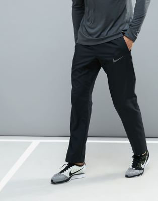 фото Черные брюки nike training dri-fit 800201-010-черный