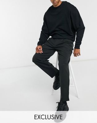 фото Черные брюки со свободными штанинами collusion-черный