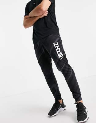 Брюки и меггинсы  Asos Черные джоггеры с принтом Nike Training Sport Clash-Черный цвет