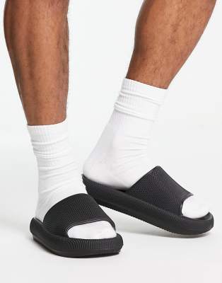 Черные фактурные шлепанцы ASOS DESIGN-Черный