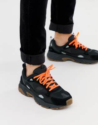 black and orange skechers