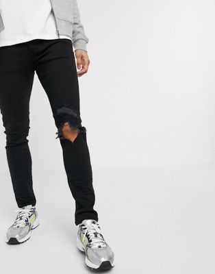 фото Черные рваные супероблегающие джинсы mennace-черный