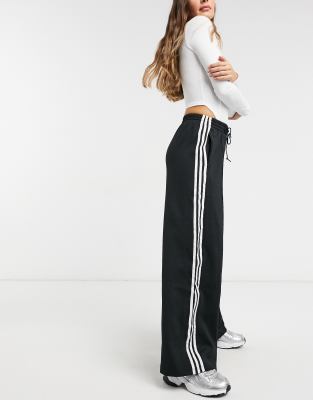 Брюки с принтами Черные широкие брюки с тремя полосами adidas Originals adicolor-Черный цвет