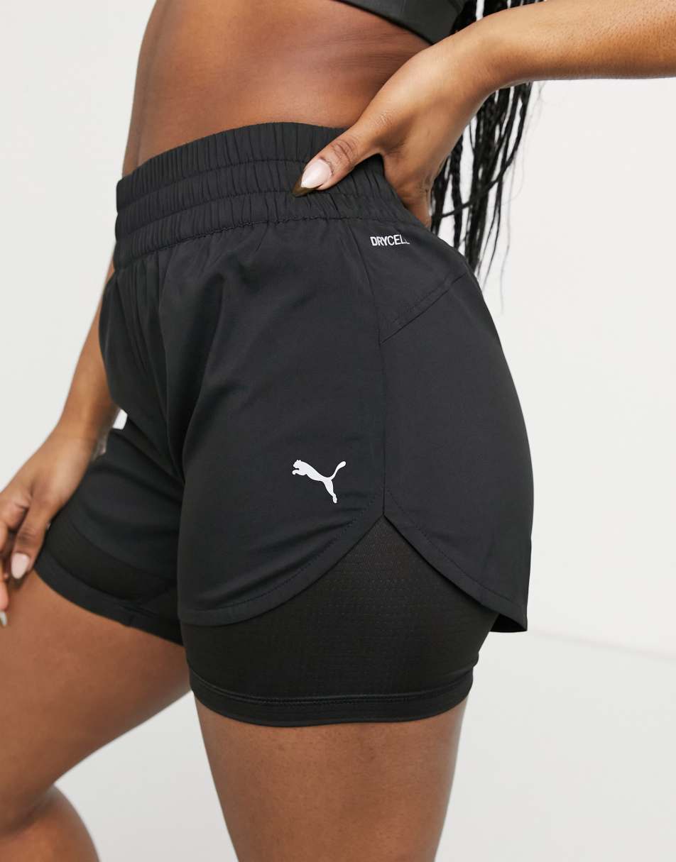 Шорты puma shorts. Шорты спортивные Run favorite Woven 2in1 3" short w. 70494310 Пума шорты. Черно-оранжевые шорты женские Puma Running favourite ASOS. Шорты Puma Run fav woman 2in1 3.