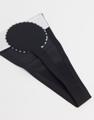 Черные стринги на клейкой основе ASOS DESIGN-Черный