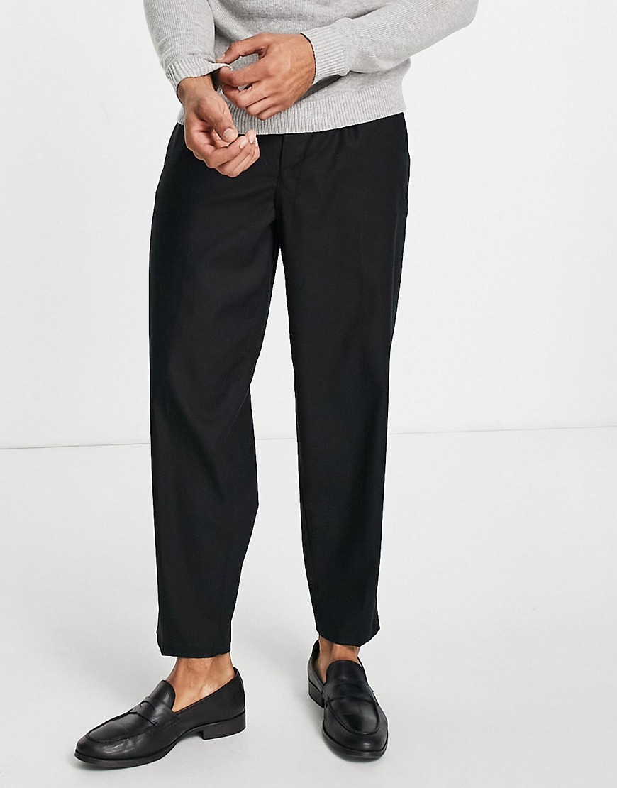фото Черные строгие брюки в стиле oversized со складками new look-черный цвет