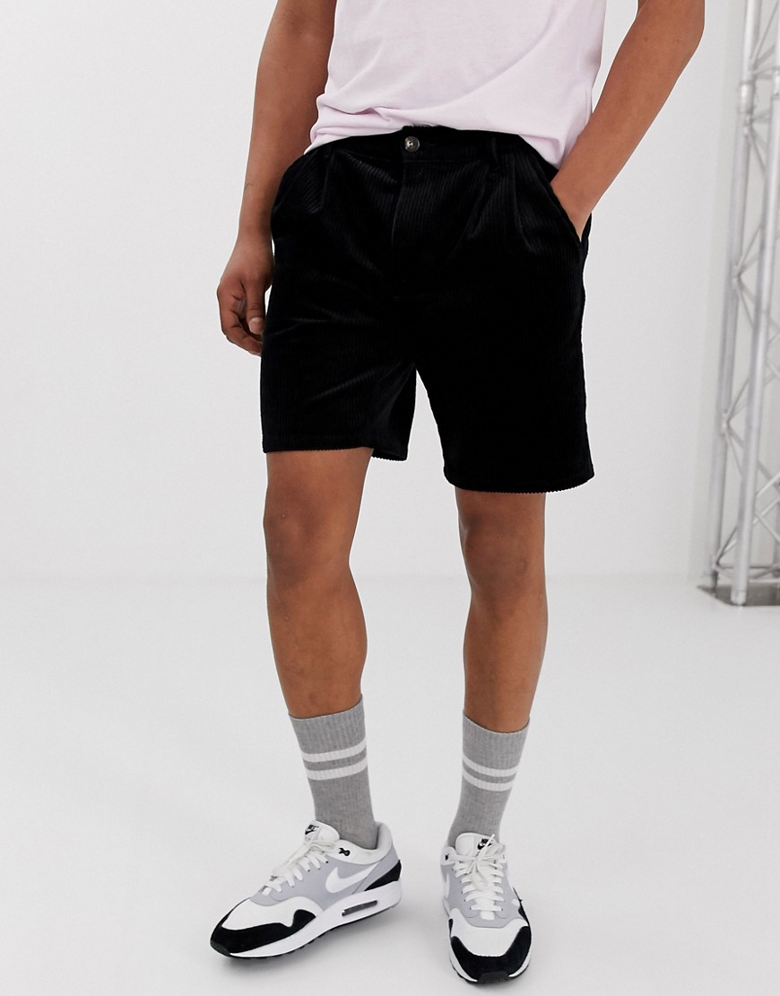 фото Черные вельветовые узкие шорты со складками asos design-черный