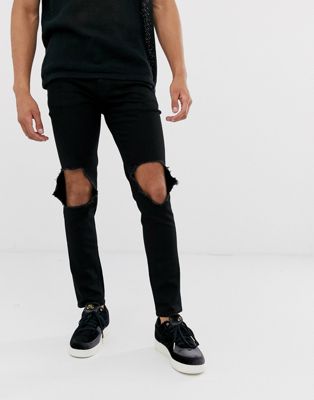 фото Черные зауженные джинсы с рваной отделкой на коленях asos design-черный