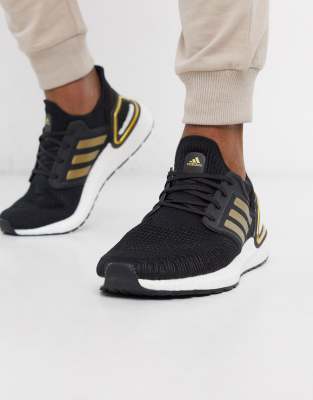 фото Черные кроссовки с золотистой отделкой adidas ultraboost 20-черный adidas performance