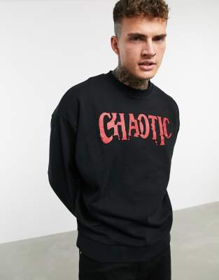 фото Черный oversized-свитшот с принтом "chaotic" asos design