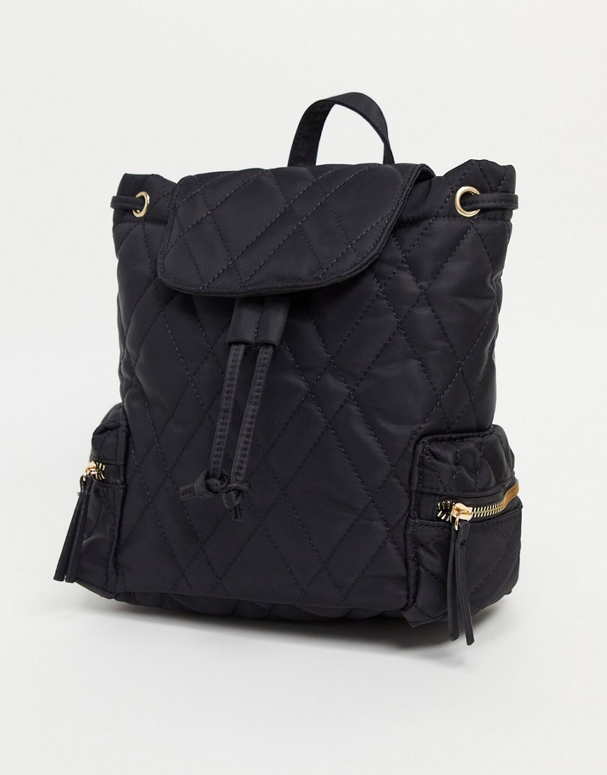 фото Черный стеганый рюкзак asos design-черный цвет
