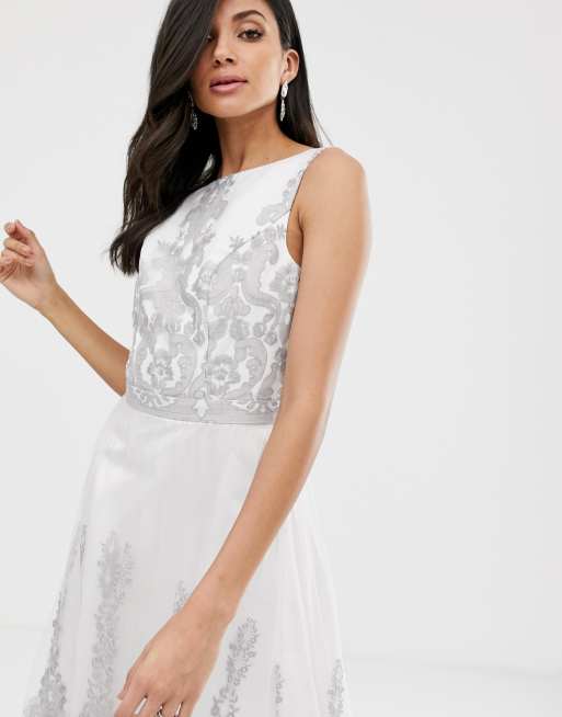 White lace shop dip hem dress