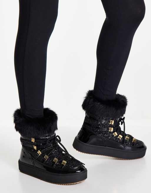 Chiara Ferragni snow boots in black and gold